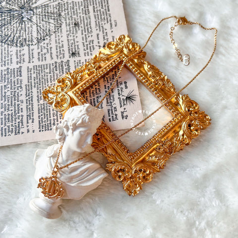Vintage Dior Gold-Finish Metal Pumpkin Car Necklace
